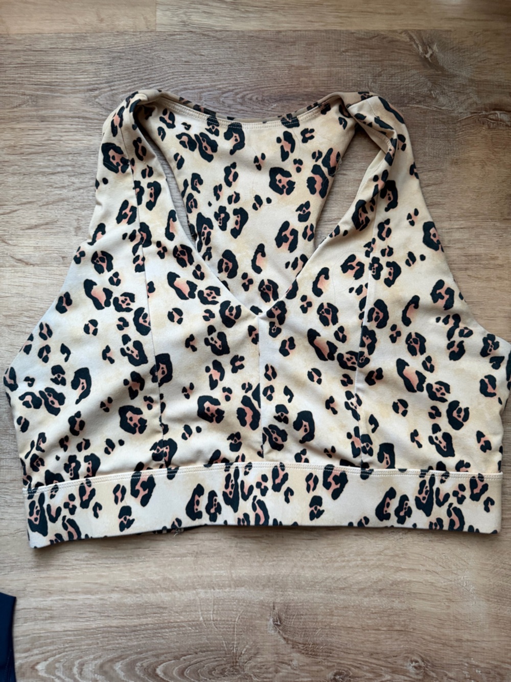 Fabletics Leopard Print V-Neck Sports Bra in Cream and Black
